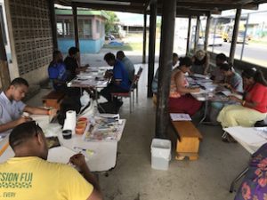 Picture of student painting during Fiji workshop